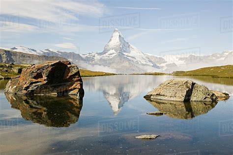 Matterhorn Reflected In A Lake Stock Photo Dissolve