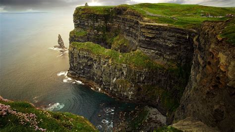 Grass Covered Cliff Sea Rocks Horizon Ireland Hd Wallpaper