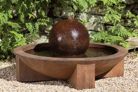 Coffee pot garden decor tutorial #uniquegardendecor. Low Zen Sphere Fountain - Give your garden a tranquil touch