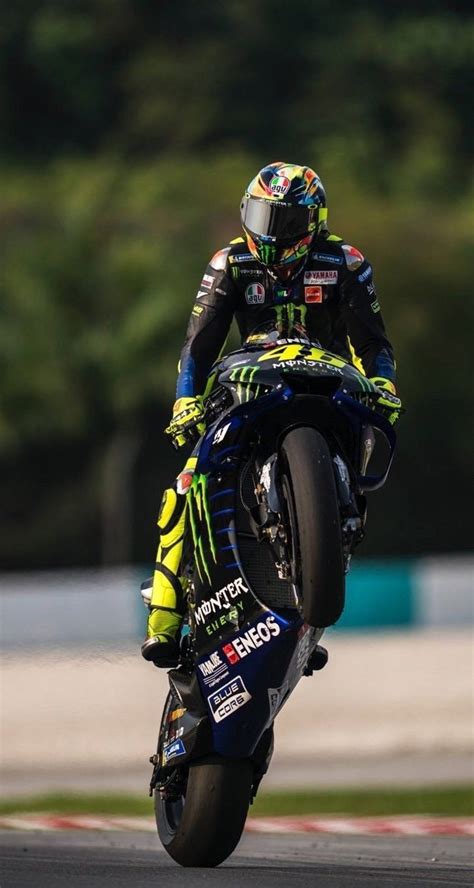 Download Valentino Rossi Motorcycle Wheelie Wallpaper