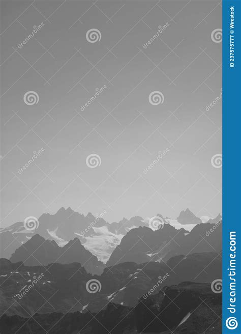 Vertical Grayscale Shot Of Snowy Mountain Peaks Stock Image Image Of
