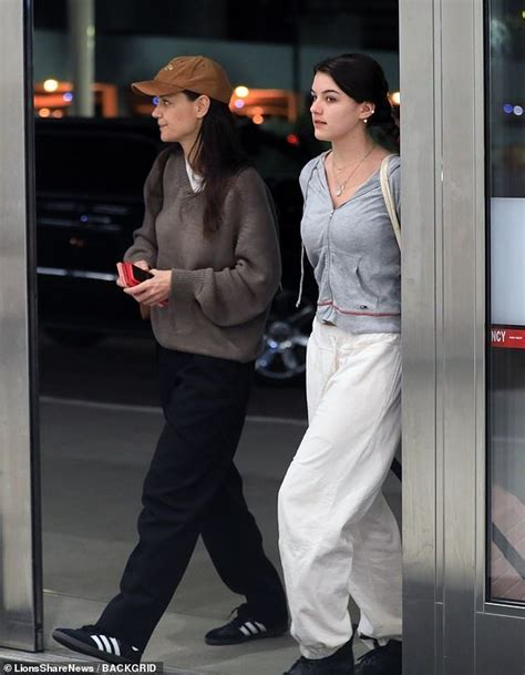 katie holmes and lookalike daughter suri cruise are spotted on rare outing together in la ny