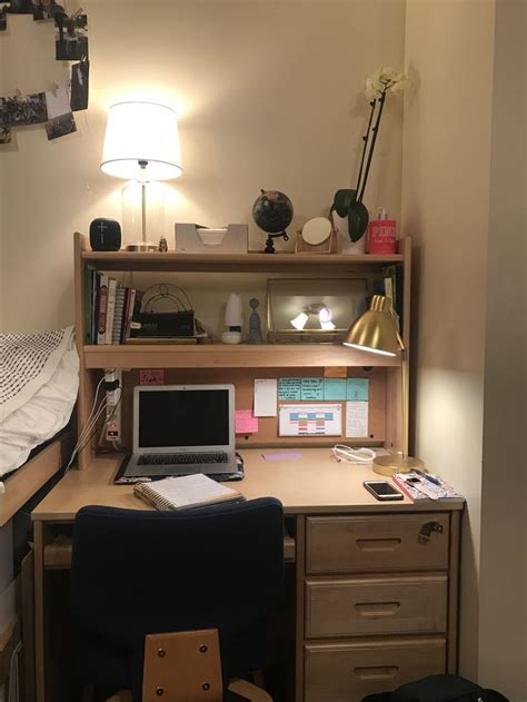 This College Dorm Room Desk Is Asymmetrical Because Of The Blue Chair It Makes The Whole Thing