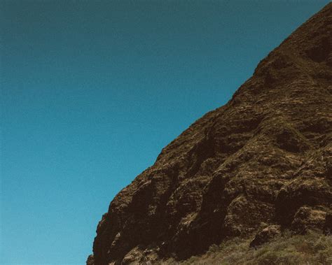 Brown Rocky Mountain Under Blue Sky · Free Stock Photo