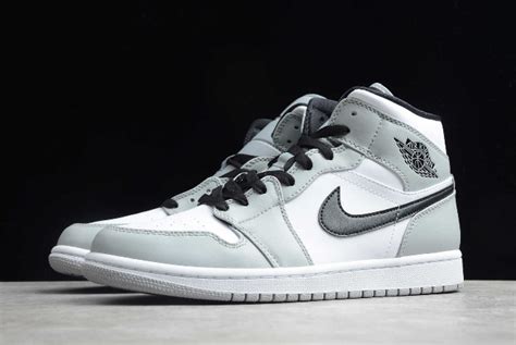 Sporting a darker colour palette, the signature premium leather panels are kitted out in a patchwork of svelt black and crispy white. 2020 New Air Jordan 1 Mid "Light Smoke Grey" 554724-092 ...