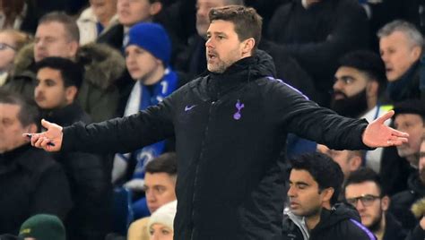 mauricio pochettino hits out at critics of spurs record with black and white trophies jab