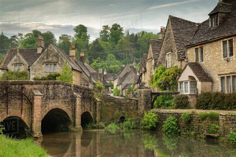 The Picturesque Cotswolds Village Of Castle Combe Wiltshire England