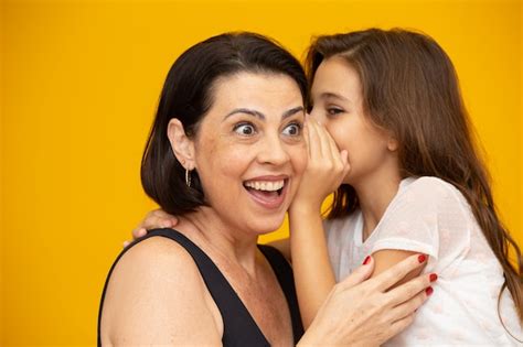 Premium Photo Mom And Daughter Sharing A Secret