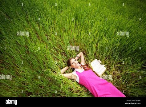 Student Girl Resting In Summer Field Stock Photo Alamy