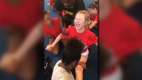 Police Investigating After Disturbing Videos Show High School Cheerleaders Forced Into Splits