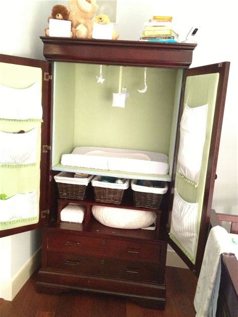converted armoire  changing station  baby nursery