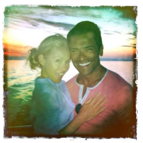 Live Host Kelly Ripa Grabs Husband Mark Consuelos Chest And Gives