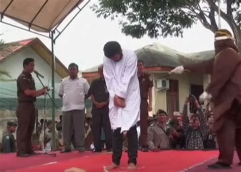 Islamic Shariah In Action Two Gay Men Caned In Indonesia As Crowd Cheers