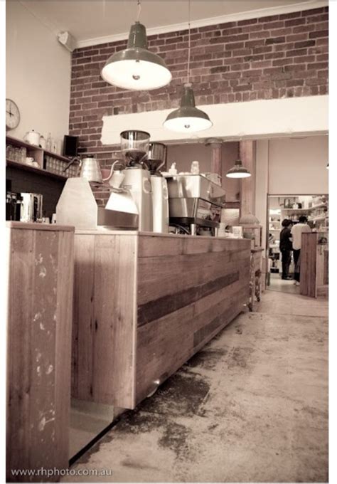Another one | Melbourne cafe, Concrete floors, Wooden counter