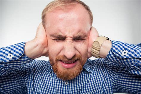 Portrait Of A Young Man Covering His Ears Stock Image Image Of Male