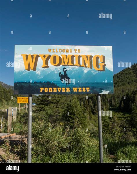 Welcome To Wyoming Road Sign At Border With Idaho In The Tetons Stock