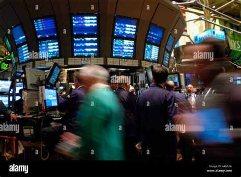 Stockbrokers Busy On The Trading Floor Of The New York Stock Exchange