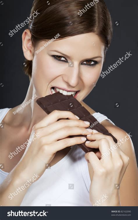 Portrait Beautiful Brunette Holding Biting Chocolate库存照片82162090 Shutterstock