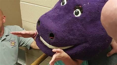 Video Of Girl Stuck In Barney Mask Goes Viral