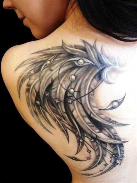 Crying small fallen angel tattoo on back shoulder. 115 Angel Wing Tattoos to Take You to Heaven