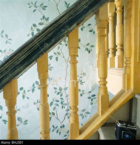 Stock Photo Close Up Of Yellow Painted Banisters On Staircase With