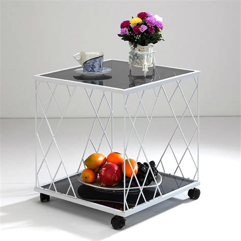 Rated 4 out of 5 stars. Glass and Metal Modern Sofa Small Coffee Table Angle Simple Fashion Small Toughened Glass Sofa ...