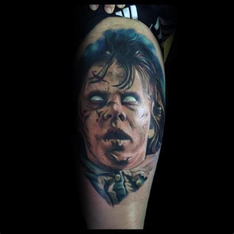 Simple grey ink horror skull tattoo on right shoulder. 80 Horror Movie Tattoos For Men - Scary Film Design Ideas