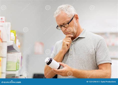 Senior Male Customer with Drug at Pharmacy Stock Photo - Image of