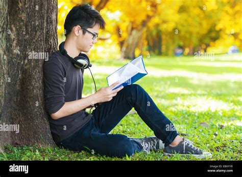 Student Sitting Reading Book Hi Res Stock Photography And Images Alamy