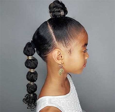The hairstyle for black kids featured below is a protective hairstyle. Wedding Hairstyles for Little Girls | Photos | FabWoman