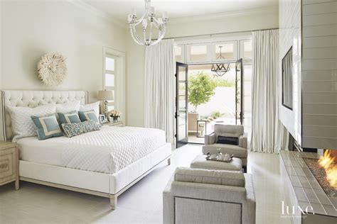 Mediterranean Neutral Bedroom With Feather Headdress Luxe Interiors