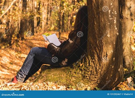 Girl Reading A Book In The Forest Stock Image Image Of Peace Leaning
