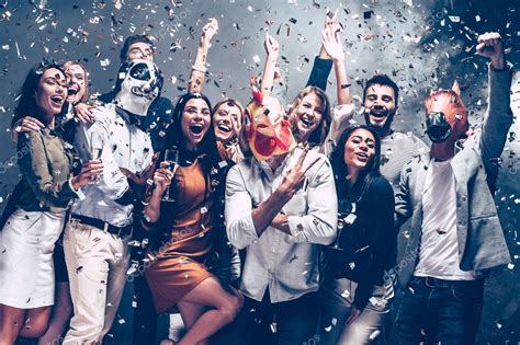 People Dancing At Party With Confetti — Stock Photo © Gstockstudio