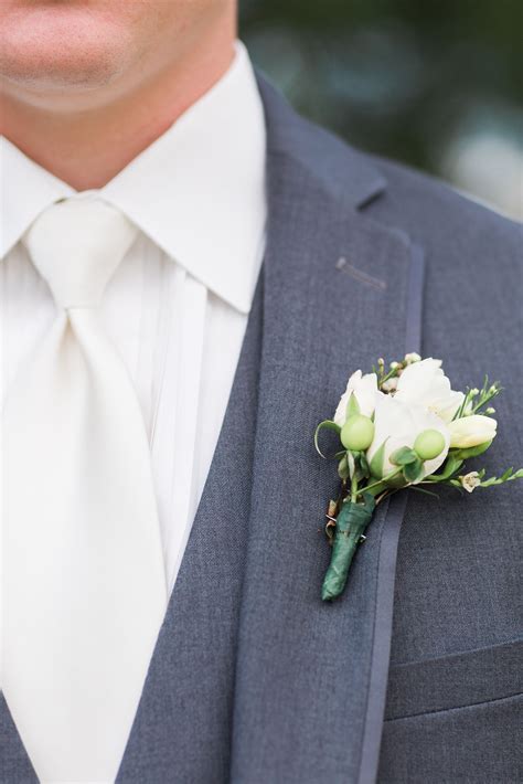 Grooms White Rose And Freesia Boutonniere