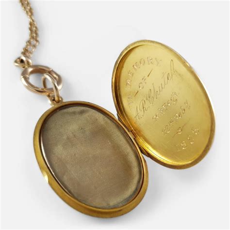 victorian 15 karat gold engraved memorial locket pendant with 9 karat chain for sale at 1stdibs