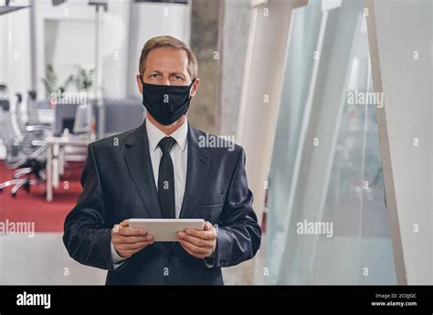 Concentrated Male Person Being In The Business Center Stock Photo Alamy