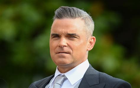 Robbie Williams says he considered suicide during a period where he was ...