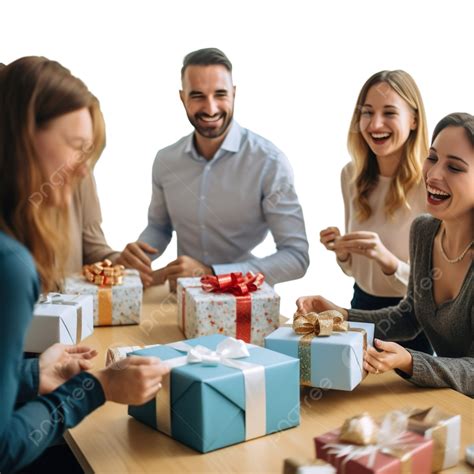 Closeup Of Colleagues Opening Presents On Christmas Party In The Office