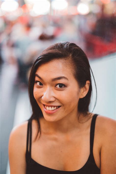 Smiling Asian Woman Portrait In Time Square By Stocksy Contributor Vero Stocksy