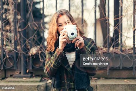 Girl Flashing Camera Photos And Premium High Res Pictures Getty Images