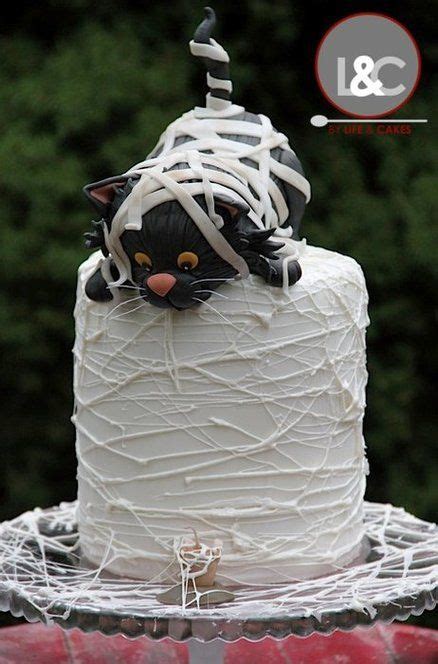 I feel like a monster ruining its lovely face! Laura | Halloween cakes, Birthday cake for cat, Cat cake