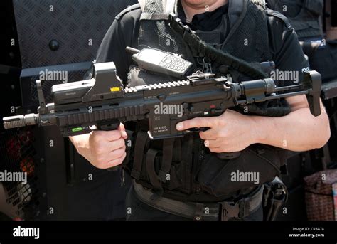 Police Firearms Officer Armed With Heckler And Koch 416 C Assault Stock