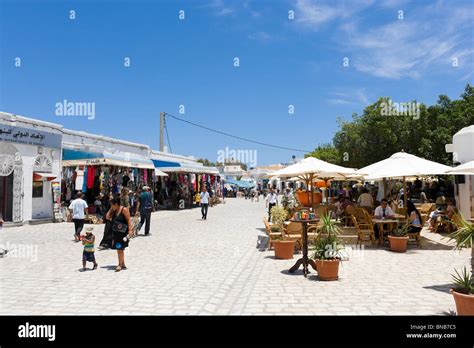 Shops And Sidewalk Cafe In The Centre Of Houmt Souk The Island Capital Djerba Tunisia Stock