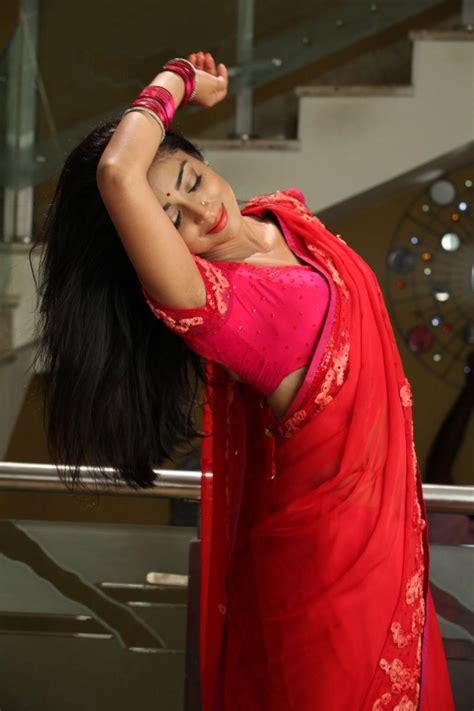 Shriya Saran In Red Hot Saree Stills South Indian Actress