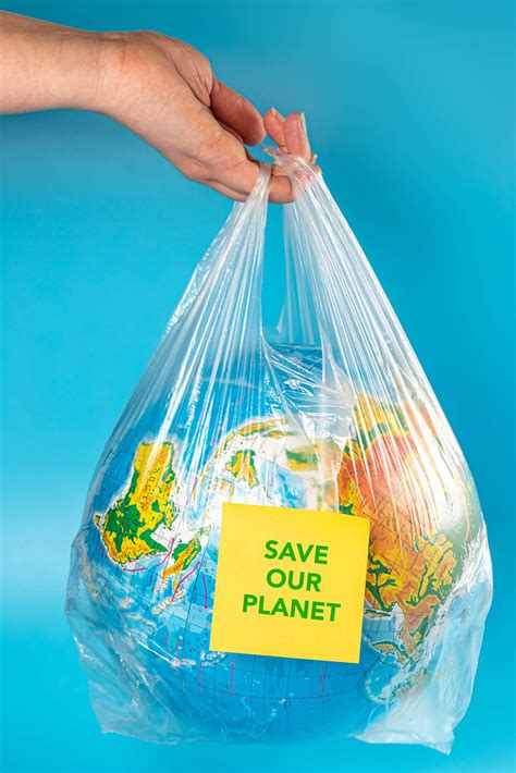 Save Our Planet Inscription On Globe In Plastic Bag Creative Commons