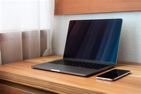 Modern Laptop On Wooden Desk Free Stock Photo Picjumbo