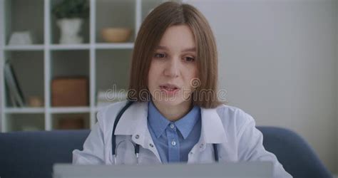 Consultation Of Doctor By Telephone Female Physician Is Answering On