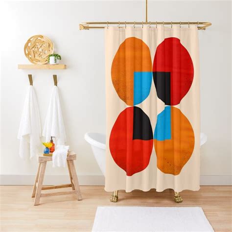 A Shower Curtain With An Abstract Design In Orange Blue And Black On