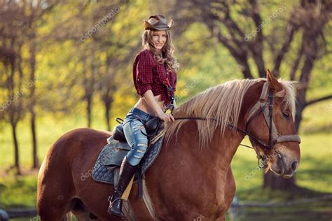 Beautiful Smiling Girl Riding Horse On Autumn Field