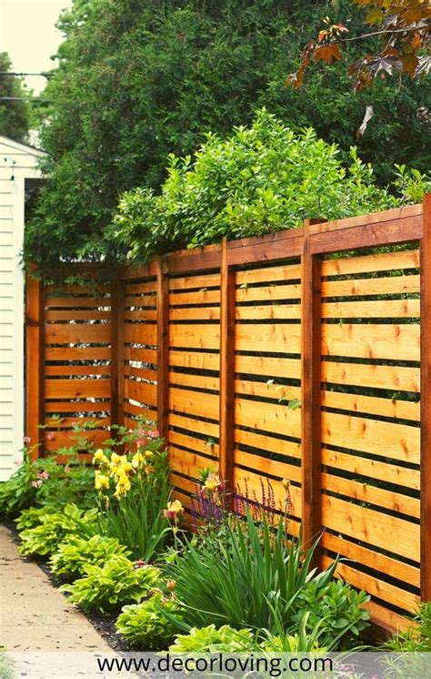 Wooden Garden Fence With Wooden Borders And Green Plants Privacy